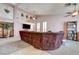 Spacious living room with high ceilings, large windows, a ceiling fan, and comfortable seating at 2301 Jean Paul Ave, North Las Vegas, NV 89031