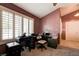 Functional office space featuring a desk, natural light, and neutral color scheme at 2301 Jean Paul Ave, North Las Vegas, NV 89031