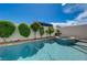 Inviting in-ground pool and attached spa in a private, fenced backyard oasis at 2301 Jean Paul Ave, North Las Vegas, NV 89031