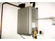 Efficient tankless water heater system for on-demand hot water in this home at 2301 Jean Paul Ave, North Las Vegas, NV 89031