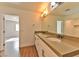 Bathroom features double sinks, modern fixtures, and an ensuite closet at 2323 Mariposa Ave, Las Vegas, NV 89104
