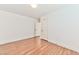 Bedroom featuring hardwood floors, neutral walls, and a closet for storage at 2323 Mariposa Ave, Las Vegas, NV 89104