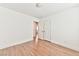 An airy bedroom featuring light hardwood floors and a neutral color palette at 2323 Mariposa Ave, Las Vegas, NV 89104