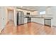 Modern kitchen with stainless steel appliances, white cabinets, and sleek countertops at 2323 Mariposa Ave, Las Vegas, NV 89104