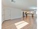 Spacious living room blending into a modern kitchen, with white cabinets and stainless steel appliances at 2323 Mariposa Ave, Las Vegas, NV 89104