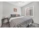 Bedroom features neutral paint, carpet, and a window with wood blinds at 2421 Gamma Ray Pl, Henderson, NV 89044