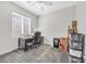 Home office features carpet, a desk, and natural light from the window at 2421 Gamma Ray Pl, Henderson, NV 89044