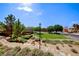 Beautiful green community space with picnic area, trees and landscaping at 2733 Auchmull St, Henderson, NV 89044