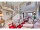 Spacious living area featuring a staircase, comfortable furniture, and neutral décor at 2733 Auchmull St, Henderson, NV 89044