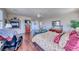 Large main bedroom with wood floors, fireplace, plantation shutters, and ample space for relaxation at 2733 Auchmull St, Henderson, NV 89044
