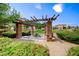Community picnic area with grill, table and seating under a pergola at 2733 Auchmull St, Henderson, NV 89044