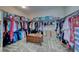 Well-organized walk-in closet with plenty of hanging space and shelving for storage, providing ample room at 2733 Auchmull St, Henderson, NV 89044