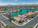 Beautiful aerial view of waterfront community with lush landscaping and serene blue waters at 3061 Waterside Cir, Las Vegas, NV 89117