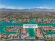 Stunning aerial view of waterfront homes and the community surrounding 3061 Waterside Circle at 3061 Waterside Cir, Las Vegas, NV 89117