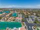 Aerial view showcasing the waterfront homes and picturesque streets in the community, surrounded by turquoise canals at 3061 Waterside Cir, Las Vegas, NV 89117