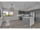 Bright eat-in kitchen offers an island, modern appliances, and ample cabinet space at 3061 Waterside Cir, Las Vegas, NV 89117