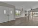 Spacious living room features stylish flooring, fireplace, and natural light at 3061 Waterside Cir, Las Vegas, NV 89117