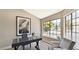 Well-lit home office with a large window and modern furnishings at 3061 Waterside Cir, Las Vegas, NV 89117