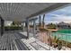 Charming covered patio with picturesque waterfront views and tranquil surroundings at 3061 Waterside Cir, Las Vegas, NV 89117