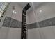 Glass shower with modern rain shower head and spray nozzles at 3061 Waterside Cir, Las Vegas, NV 89117
