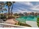 Picturesque waterfront with lush landscaping, private dock, and stunning canal views at 3061 Waterside Cir, Las Vegas, NV 89117