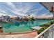 Scenic view of the waterfront, showcasing the calm blue canal and waterfront homes at 3061 Waterside Cir, Las Vegas, NV 89117