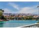 Stunning waterfront view of luxury homes and serene, blue waters at 3061 Waterside Cir, Las Vegas, NV 89117