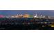 Stunning night view of the Las Vegas city skyline showcasing the dazzling lights and vibrant urban landscape at 34 Olympia Outlook Dr, Las Vegas, NV 89141
