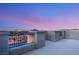 Residential rooftop patio offering panoramic views of the city skyline at twilight at 34 Olympia Outlook Dr, Las Vegas, NV 89141