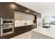Stylish kitchen with modern appliances, sleek cabinetry, and ample counter space at 34 Olympia Outlook Dr, Las Vegas, NV 89141