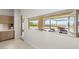 Open-air patio with views of the pool and mountains in the distance at 34 Olympia Outlook Dr, Las Vegas, NV 89141