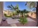 Wide open backyard with desert garden and outdoor seating area that is ready for outdoor activities at 3420 Lockport St, Las Vegas, NV 89129