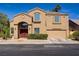 Inviting two-story home with a well-maintained exterior and attached garage at 3420 Lockport St, Las Vegas, NV 89129