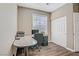 Cozy home office with hardwood floors, neutral paint, and large window for plenty of natural light at 3420 Lockport St, Las Vegas, NV 89129