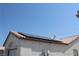 Home exterior featuring solar panels on the roof, adding energy efficiency at 3524 Silver Lantern Dr, North Las Vegas, NV 89032