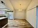 Bright dining room with chandelier and sliding door access to the outside at 3821 Dream St, Las Vegas, NV 89108