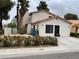A charming home featuring desert landscaping and a well-maintained stucco exterior at 3821 Dream St, Las Vegas, NV 89108