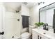 Well-lit bathroom features a shower, toilet, and vanity with modern fixtures at 416 Greenbrook St, Las Vegas, NV 89110