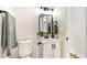A clean, modern bathroom with updated fixtures and white cabinetry at 416 Greenbrook St, Las Vegas, NV 89110