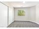 Spare bedroom featuring carpet, baseboard, and a window to let the light in at 416 Greenbrook St, Las Vegas, NV 89110