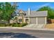 Beautiful two-story home with a two-car garage and well-manicured front lawn at 416 Greenbrook St, Las Vegas, NV 89110