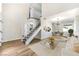 Bright living room boasts high ceilings and staircase leading to the second story loft at 416 Greenbrook St, Las Vegas, NV 89110