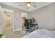 Bedroom with light wood floors, gray walls, ceiling fan, and closet at 421 Raindance Dr, Henderson, NV 89014
