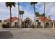 Exterior view of community entrance with desert landscaping and red tile roofs at 421 Raindance Dr, Henderson, NV 89014