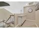 Bright hallway with stylish built-in cabinets provides ample storage on the second floor at 421 Raindance Dr, Henderson, NV 89014