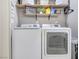 Dedicated laundry room features modern washer and dryer at 421 Raindance Dr, Henderson, NV 89014