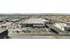 Wide aerial shot captures building surrounded by parking spaces and other buildings at 4381 W Flamingo Rd # 1003, Las Vegas, NV 89103