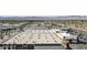 Wide aerial shot captures commercial building with surrounding buildings and mountains in distance at 4381 W Flamingo Rd # 1003, Las Vegas, NV 89103