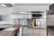 Well-equipped kitchenette with stainless steel appliances and a functional layout at 4381 W Flamingo Rd # 1003, Las Vegas, NV 89103