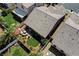 Aerial view of a landscaped backyard with a firepit and patio seating, perfect for outdoor relaxation at 448 Bright Moon Ave, North Las Vegas, NV 89084